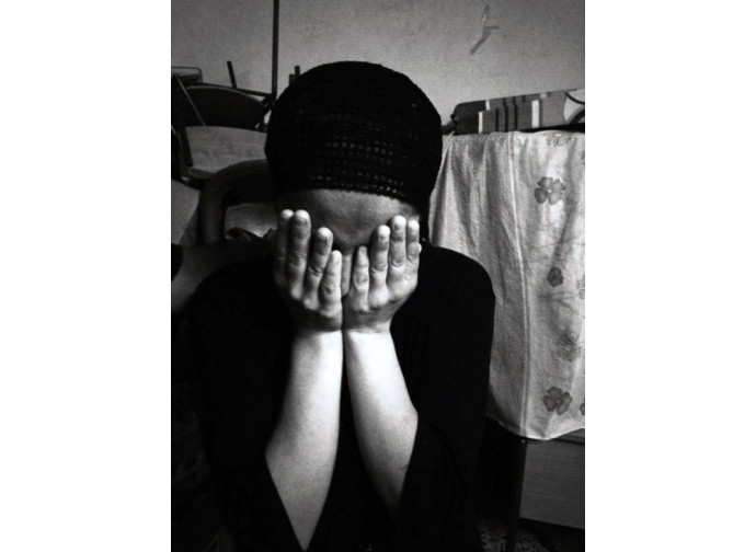 Il volto di una cristiana rifugiata in Kurdistan Il volto di una cristiana rifugiata in Kurdistan